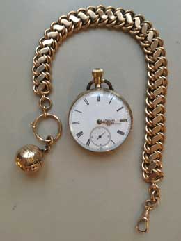 Gouden herenhorloge.