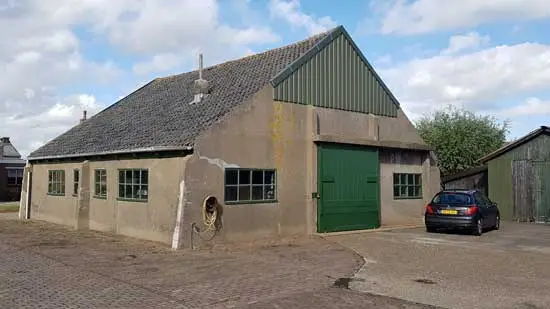 De timmerwerkplaats aan de Ooievaarsweg.
