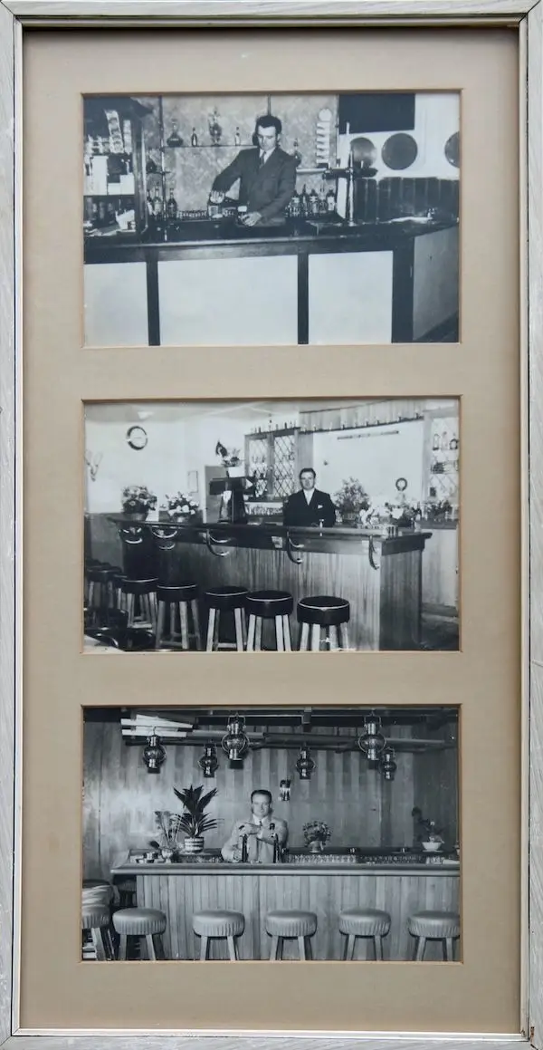 Dirk Kuin achter de bar